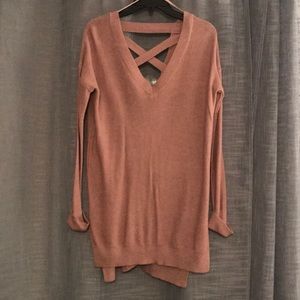 Mauve sweater with cross and low v on the back